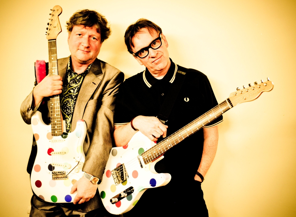 Glenn Tilbrook and Chris Difford with Damien Hirst guitars